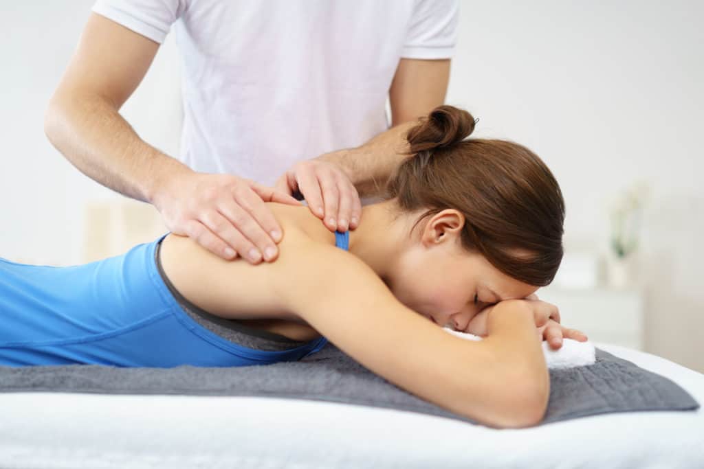 Woman receiving physical therapy 